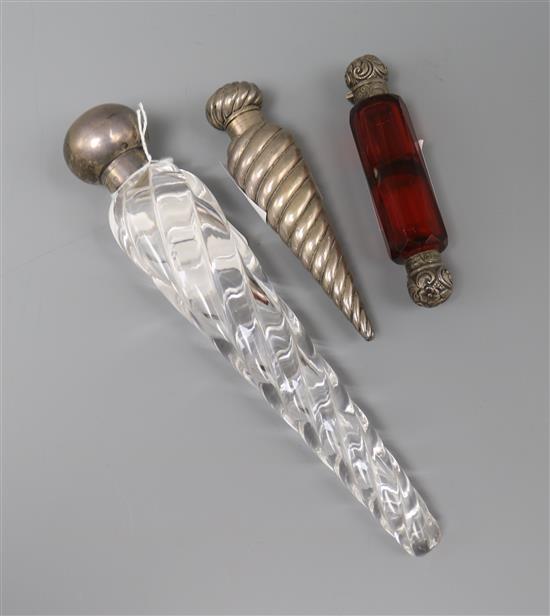Three silver mounted glass scent bottles, including double ended and two teardrop, largest 21.6cm.